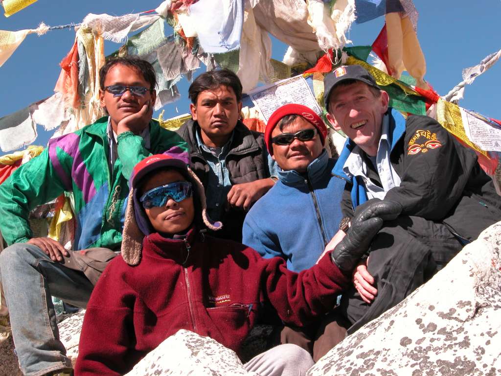 Manaslu 09 03 Team On The Larkya La Here is my crew and I on the Larkya La (5213m). From left to right: cook Schandra, porter Ram, porter Satis, and guide Gyan Prasad Tamang (gptamang@hotmail.com).